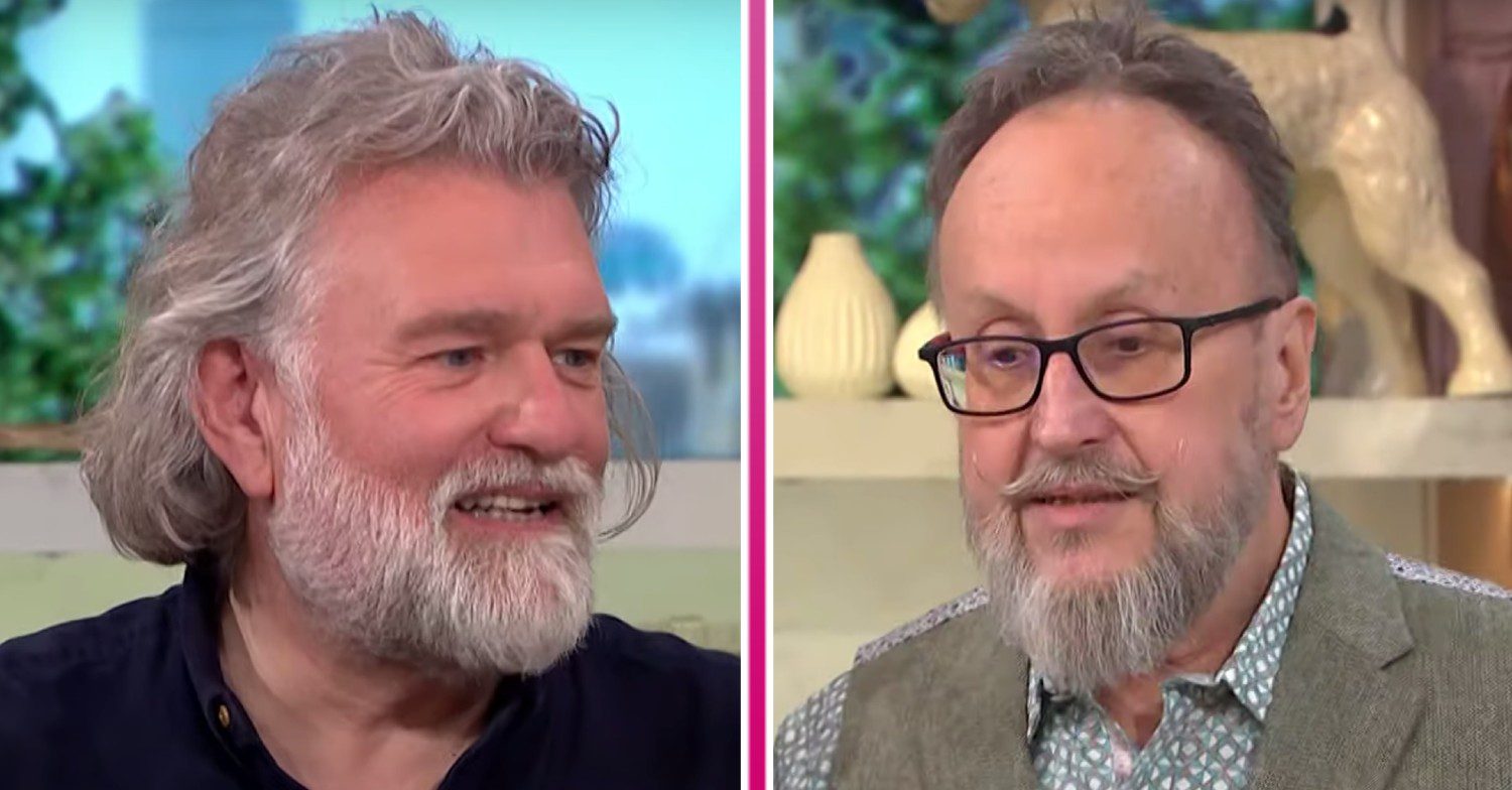 Hairy Bikers Si King smiles, Dave Myers listens