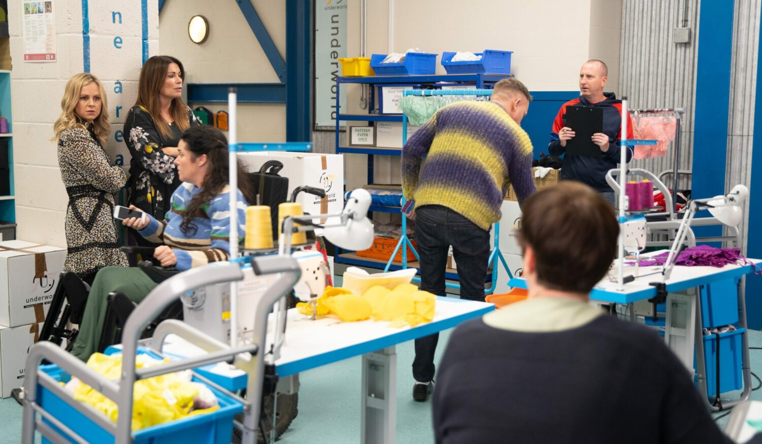 Carla and Sarah in the factory on Corrie