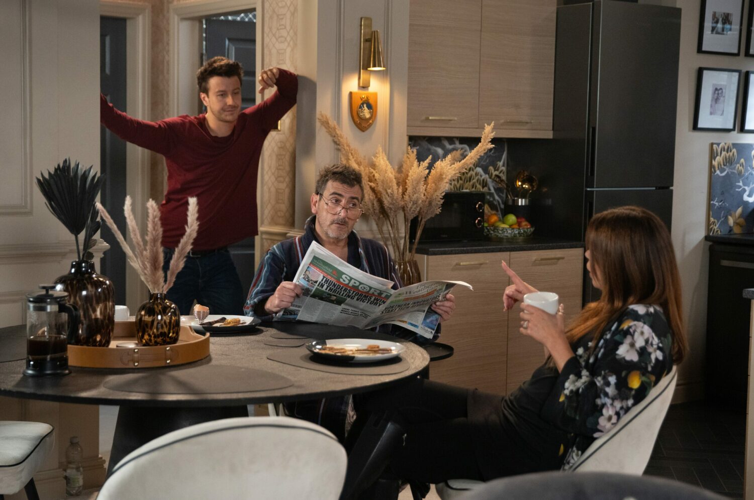 Ryan at home with Peter and Carla on Corrie