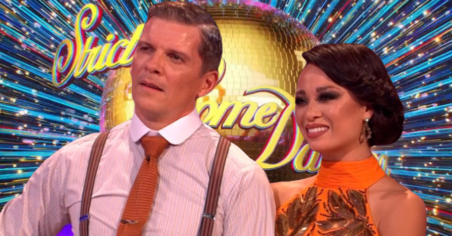Nigel Harman and Katya Jones in front of Strictly logo