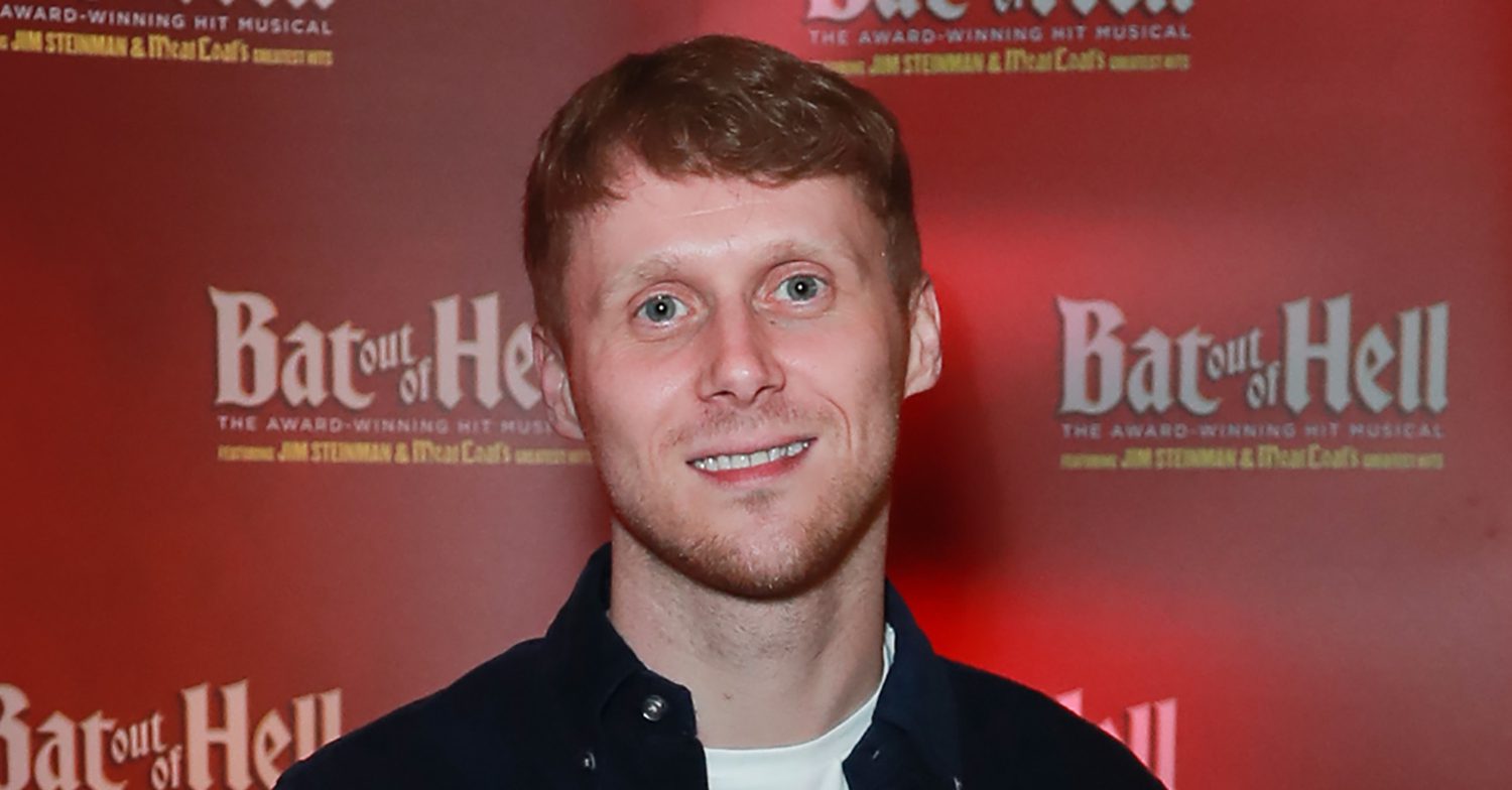EastEnders' Jamie Borthwick is smiling at an event