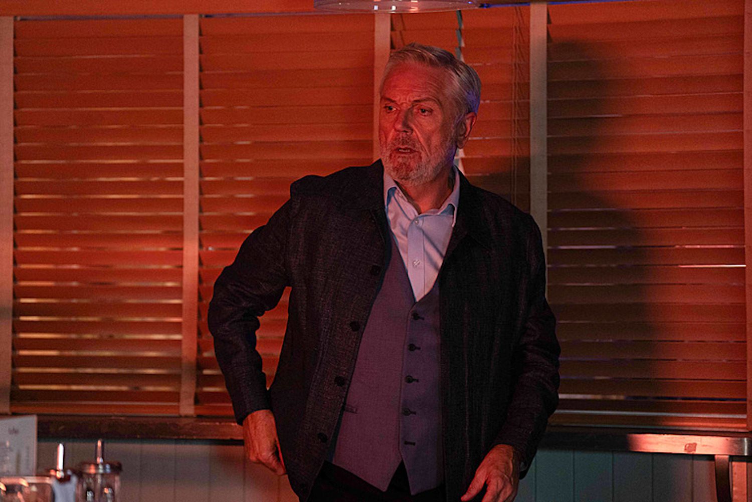 Rocky looking at fire on EastEnders