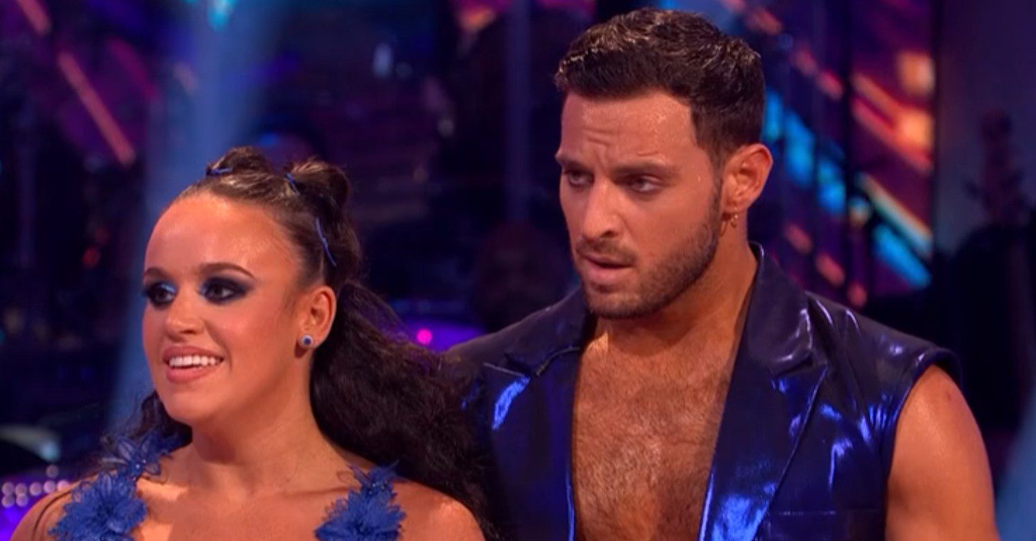 Ellie and Vito listening to the judges on Strictly