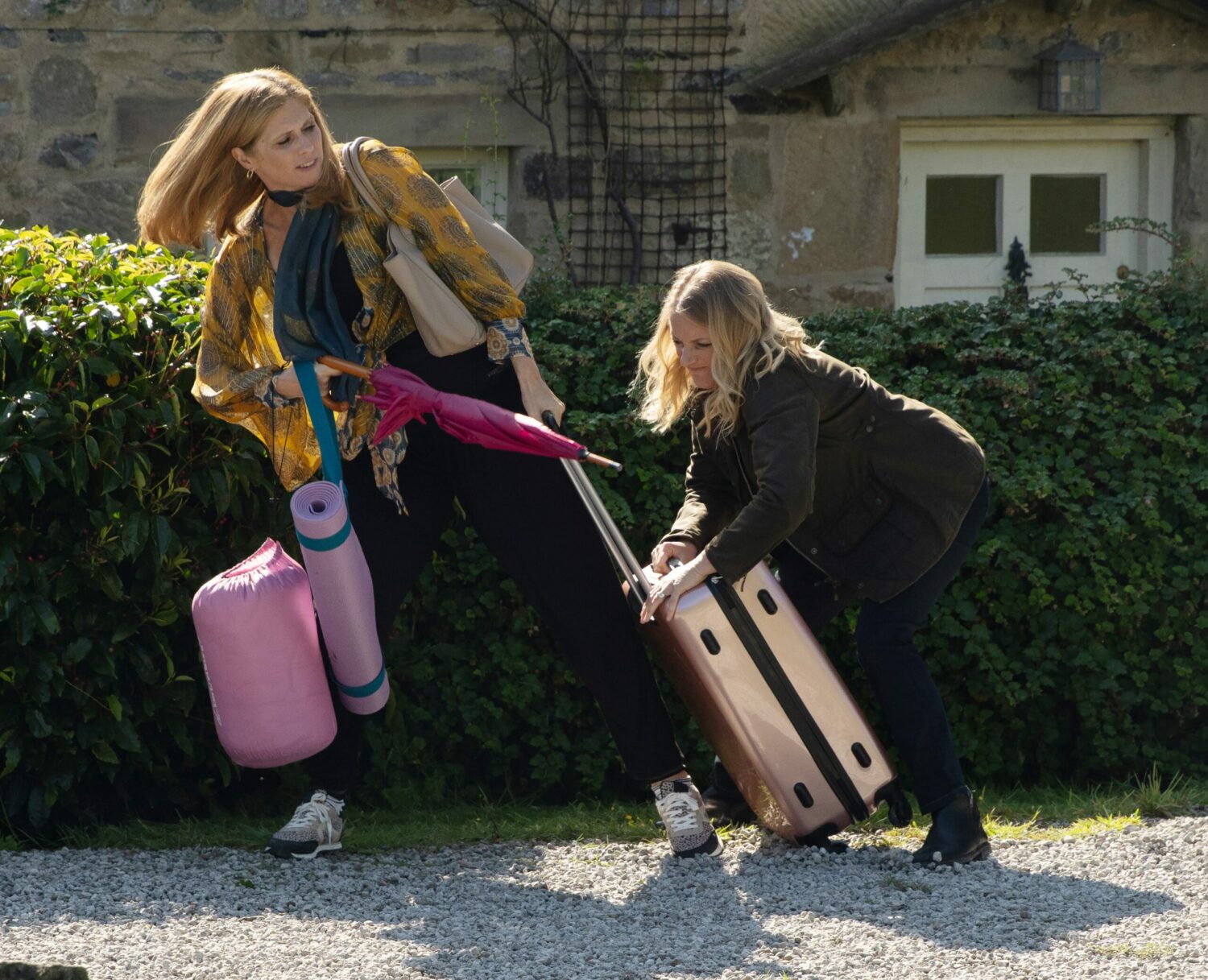 Bernice Blackstock tries to flee as Nicola grabs her suitcase