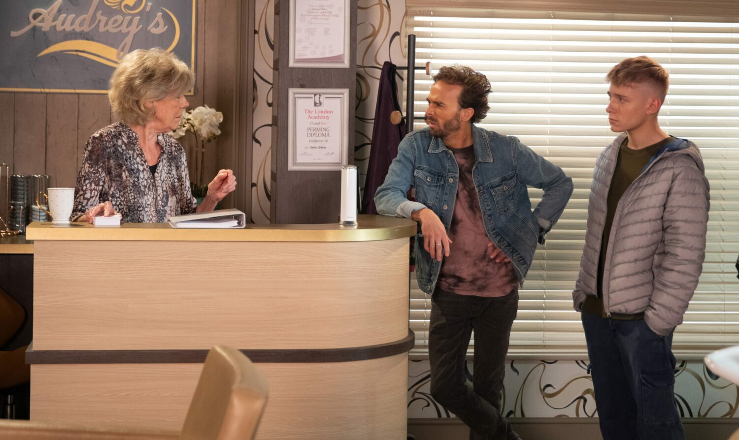 David looks confused in Corrie as Audrey talks to him and Max in the salon