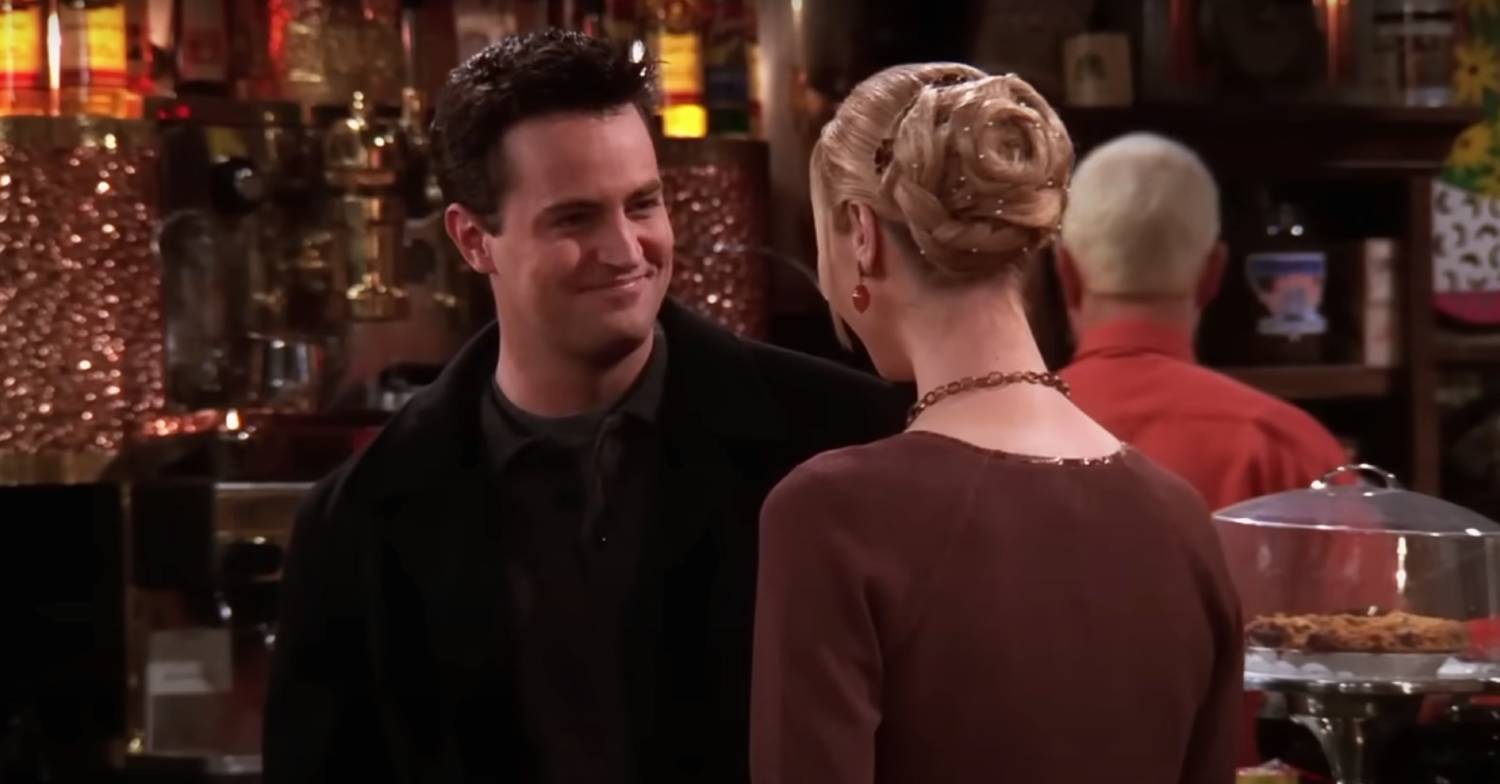 Matthew Perry in character as Chandler Bing shares a scene with Lisa Kudrow in Friends
