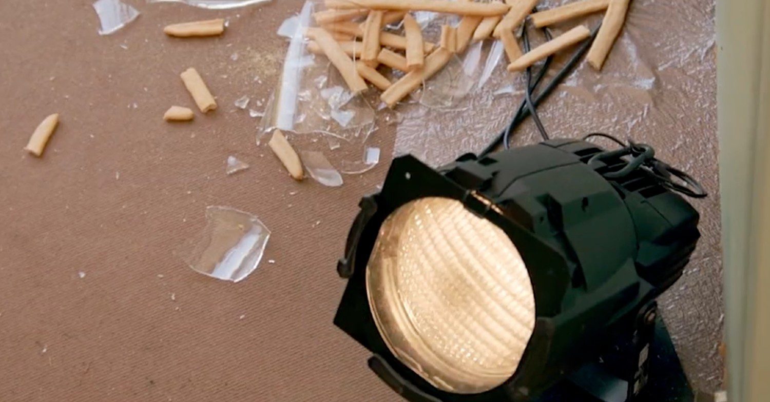 A lighting laying on the floor of the Bake Off tent next to smashed glass after Noel threw a lemon