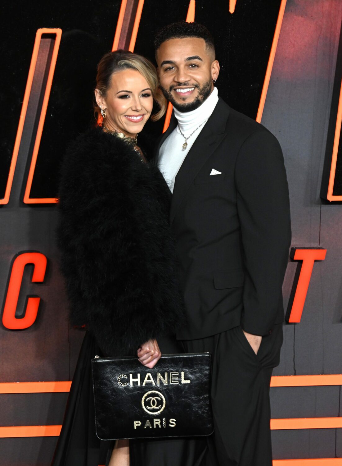 Sarah and Aston Merrygold smile on the red carpet
