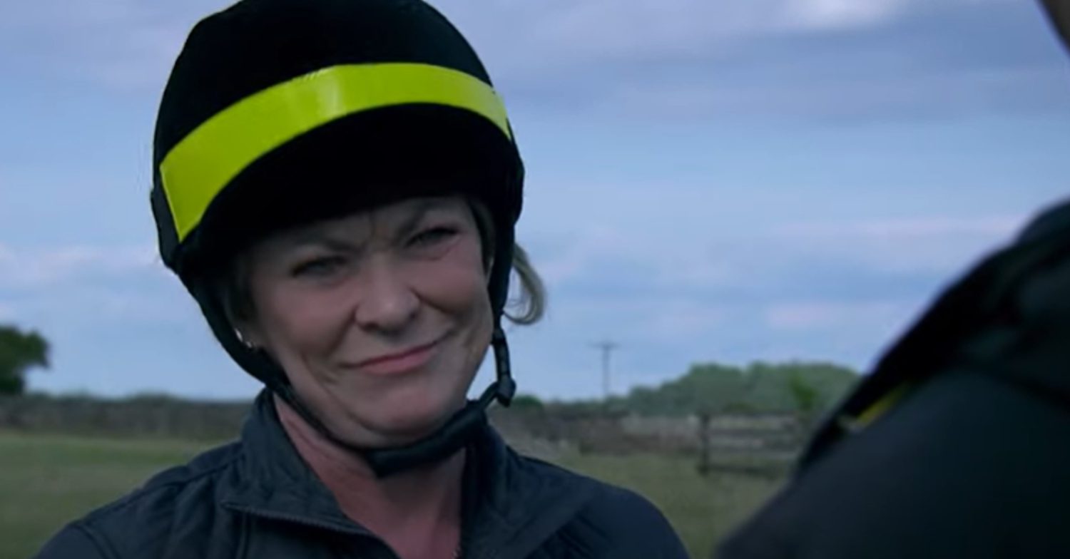 Emmerdale's Kim is wearing a horse riding helmet
