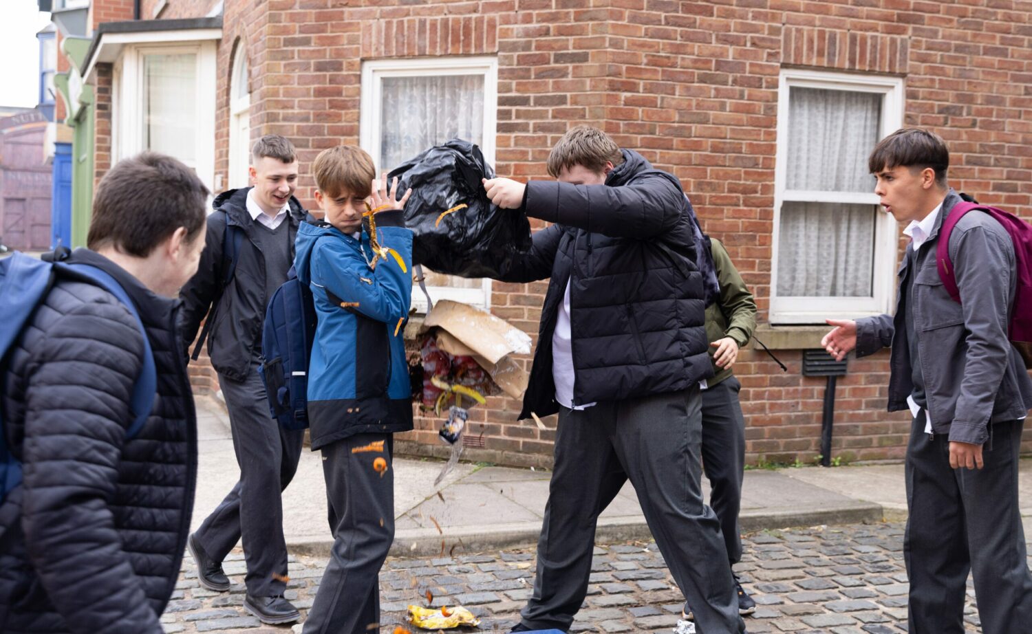 Coronation Street's Liam is having rubbish thrown at him by Mason and his friends