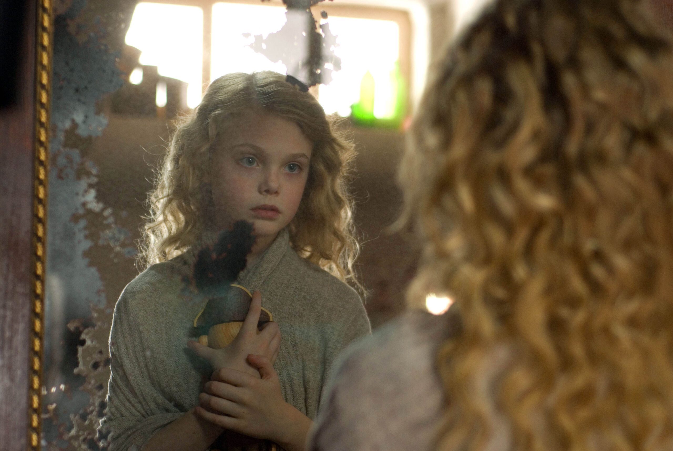 Elle Fanning receiving a gift in The Nutcracker In 3D (2010)