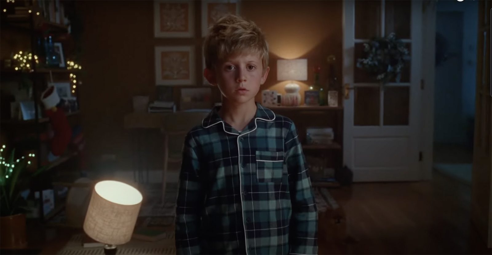 Little boy looking sad in the John Lewis Christmas Advert 2023