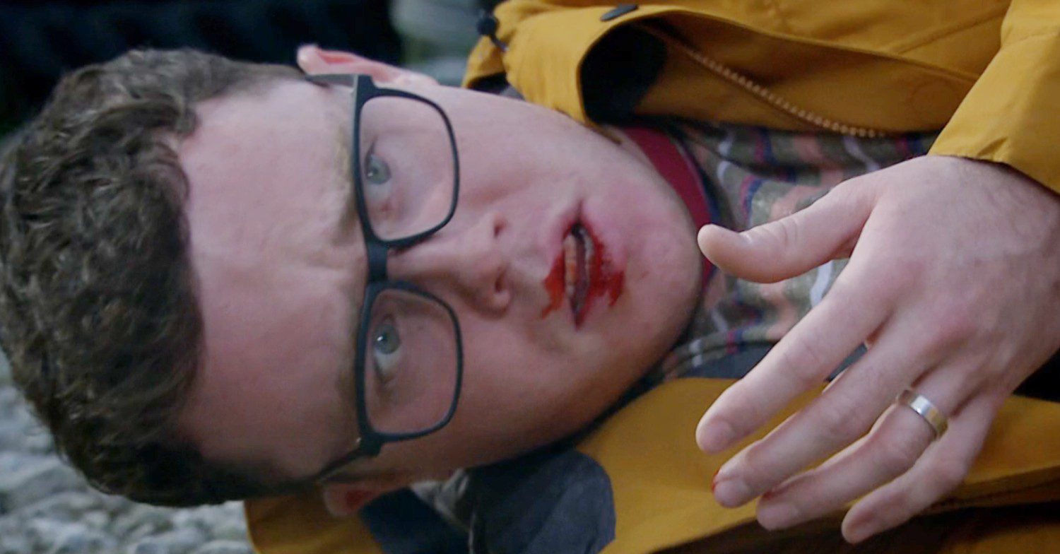 Vinny in Emmerdale lies bleeding on the floor