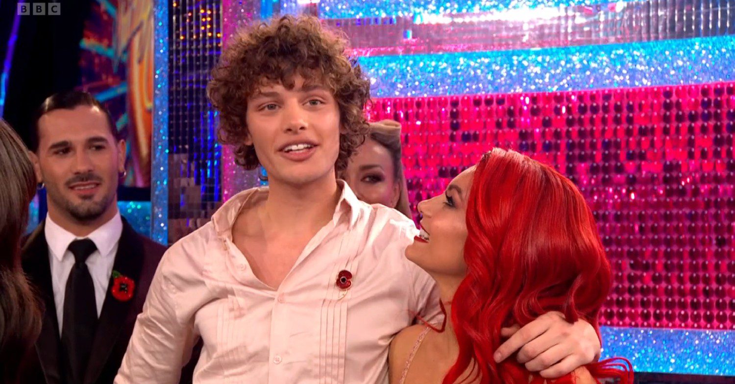 Dianne Buswell looking up at Bobby Brazier