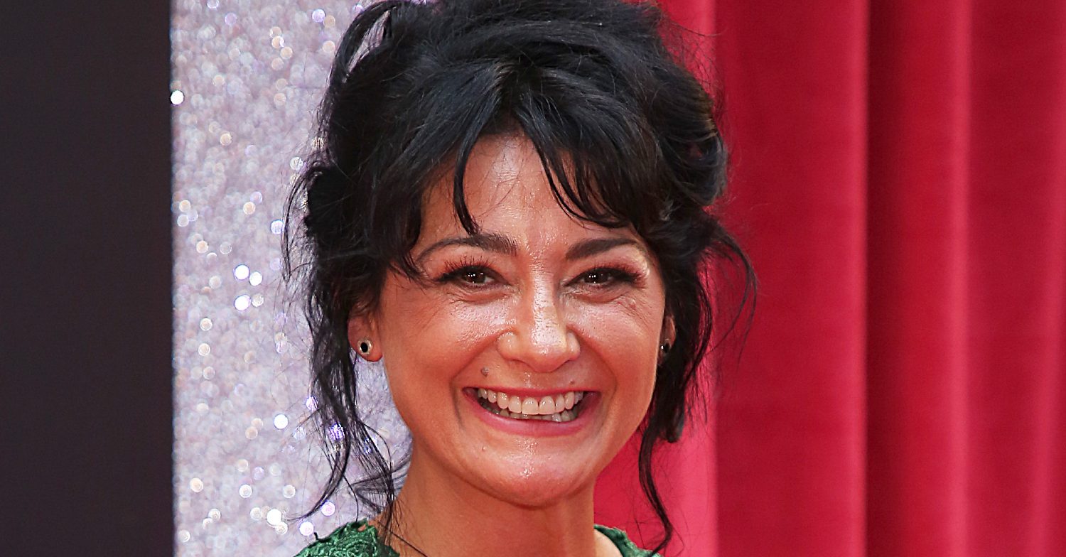 Emmerdale's Natalie J Robb is smiling on the red carpet