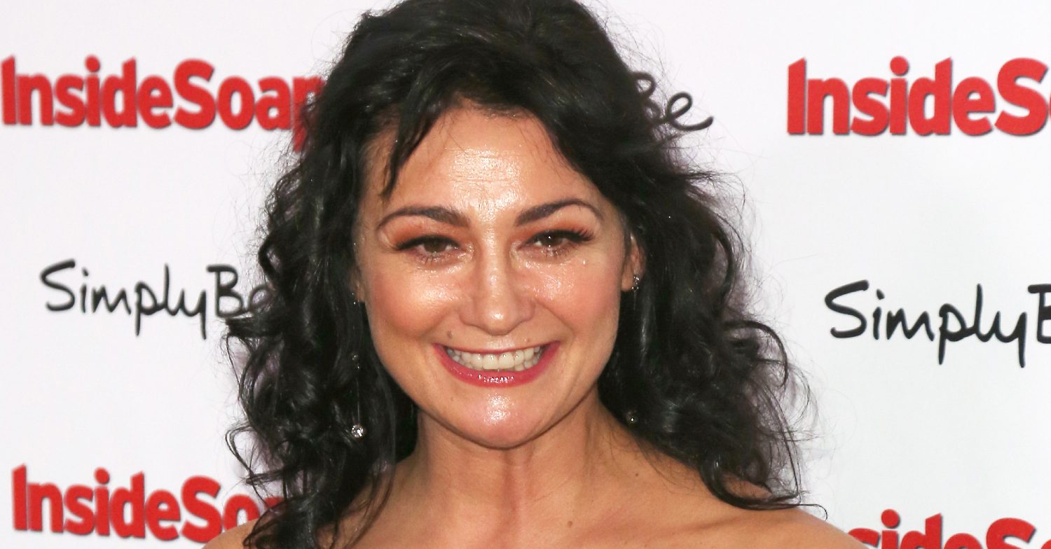 Emmerdale's Natalie J Robb is smiling at an awards event