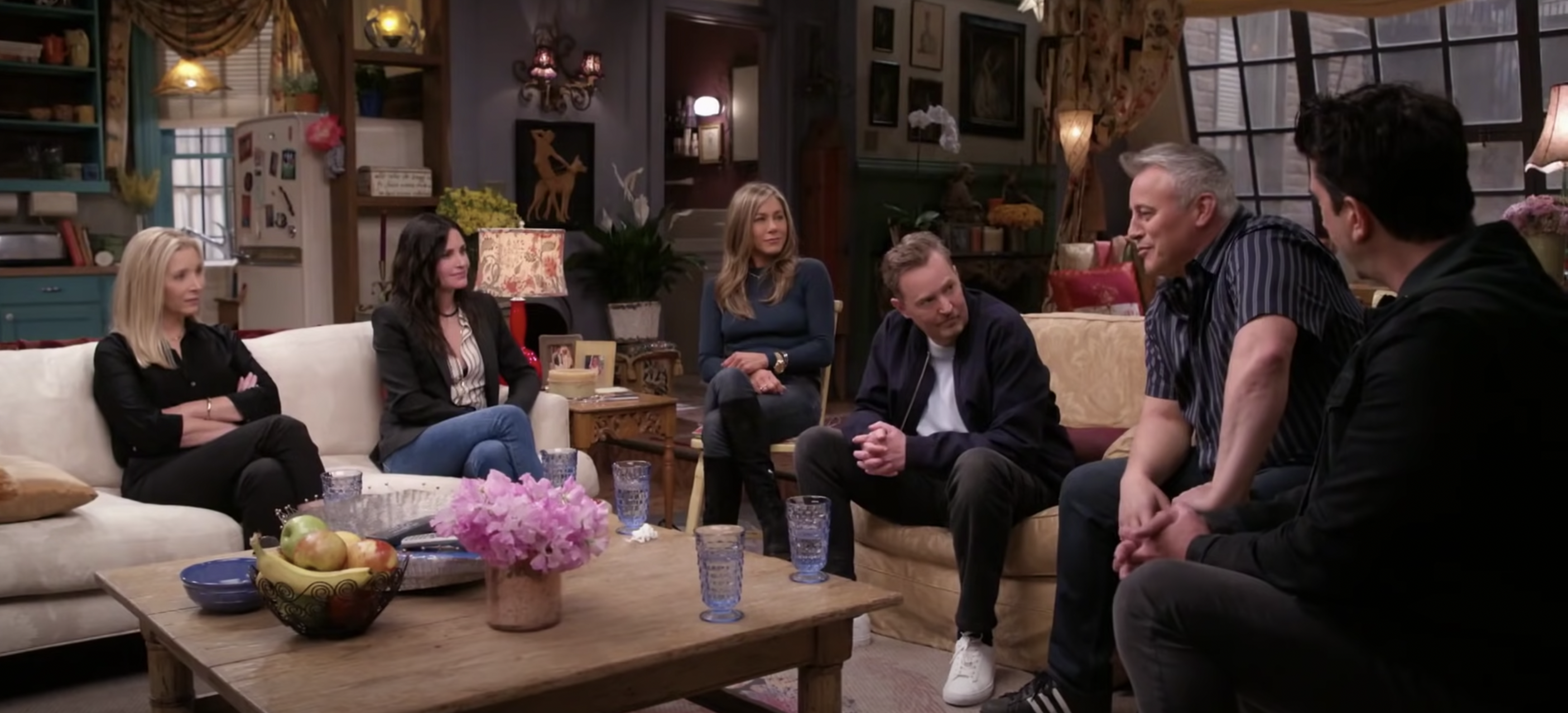 The main cast of Friends sitting together