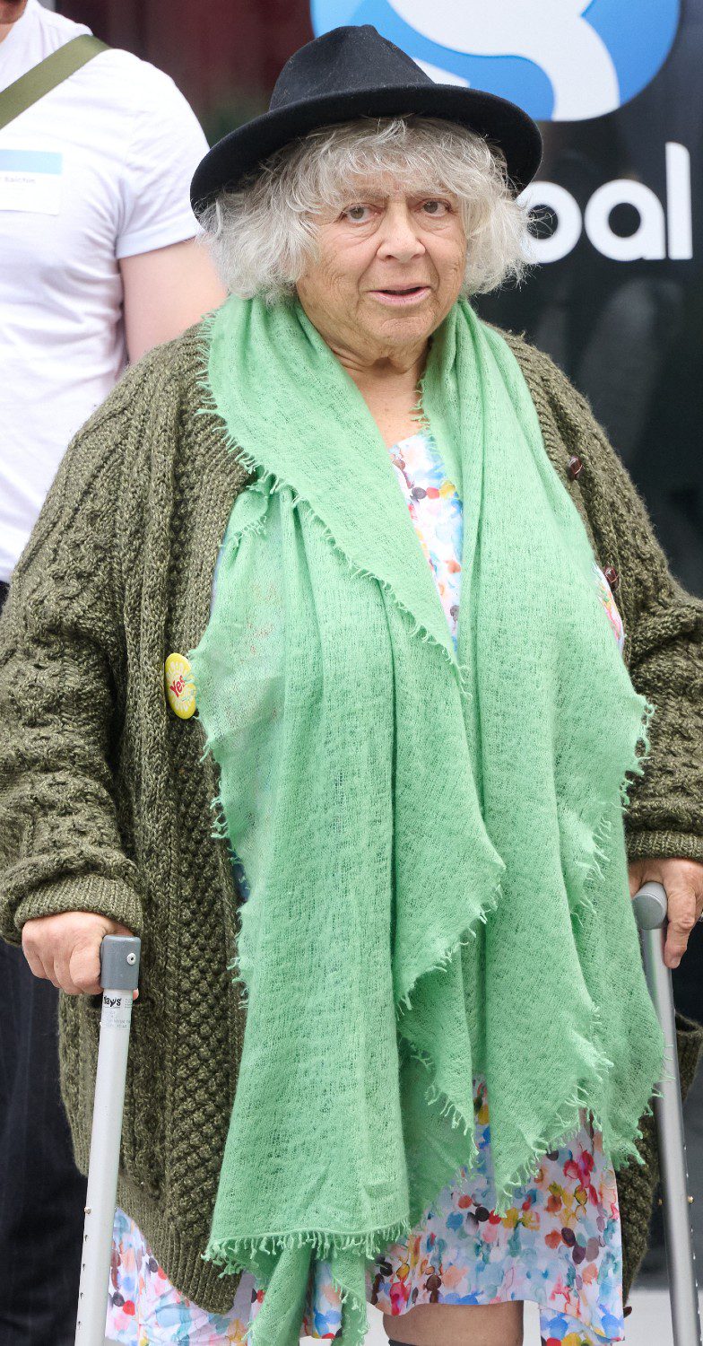 Miriam Margolyes wearing green scarf