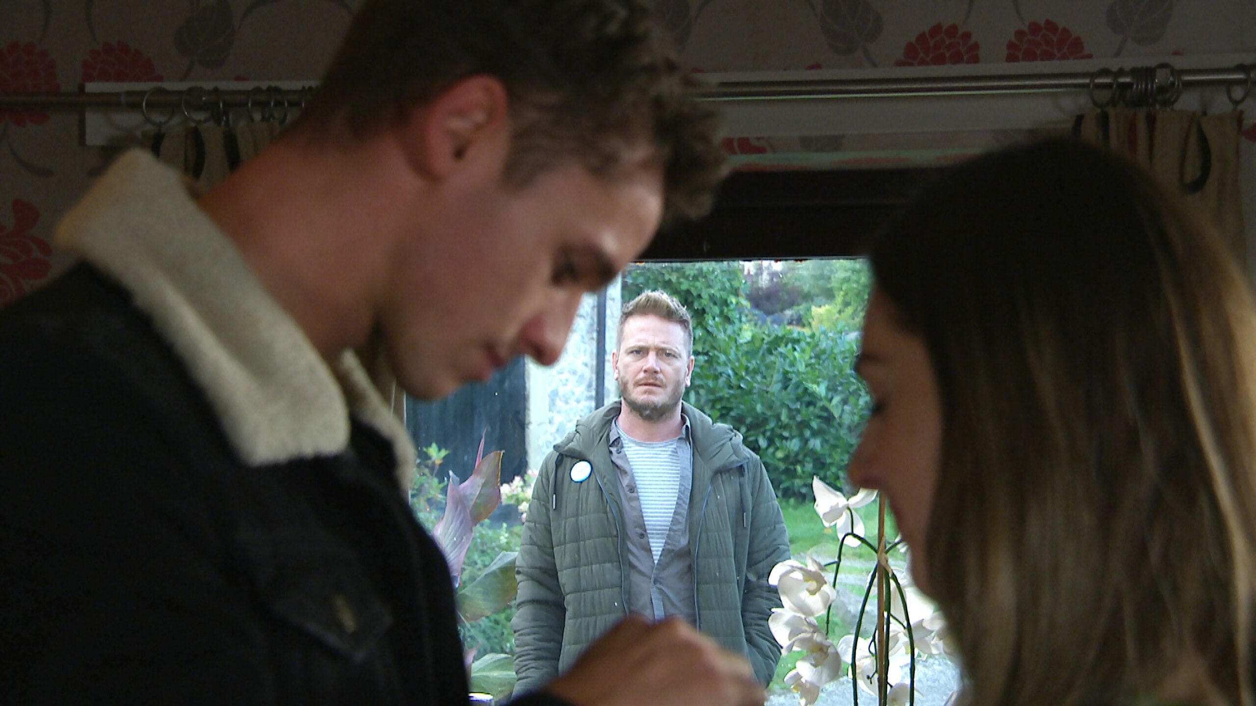 Emmerdale's Jacob and Vic are together as David looks through the window