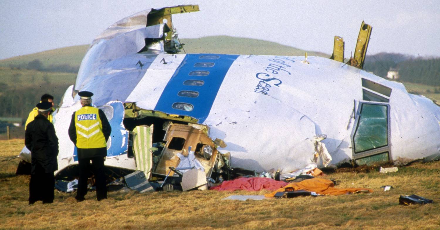 Police officers attend the site of the Lockerbie bombing