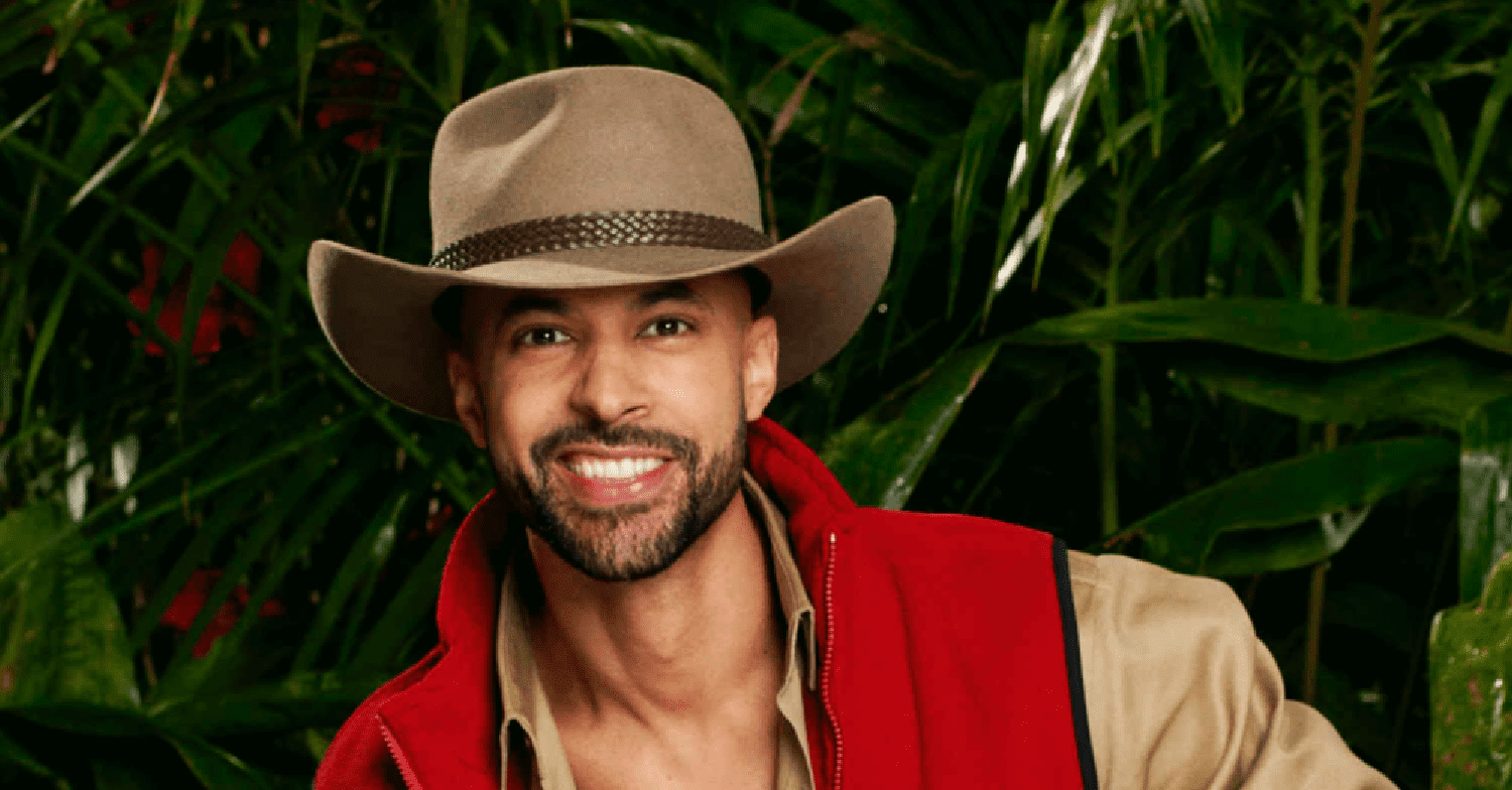 Marvin Humes smiling in his I'm a Celebrity outfit
