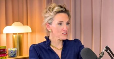Grace Dent wears a blue shirt and smiles