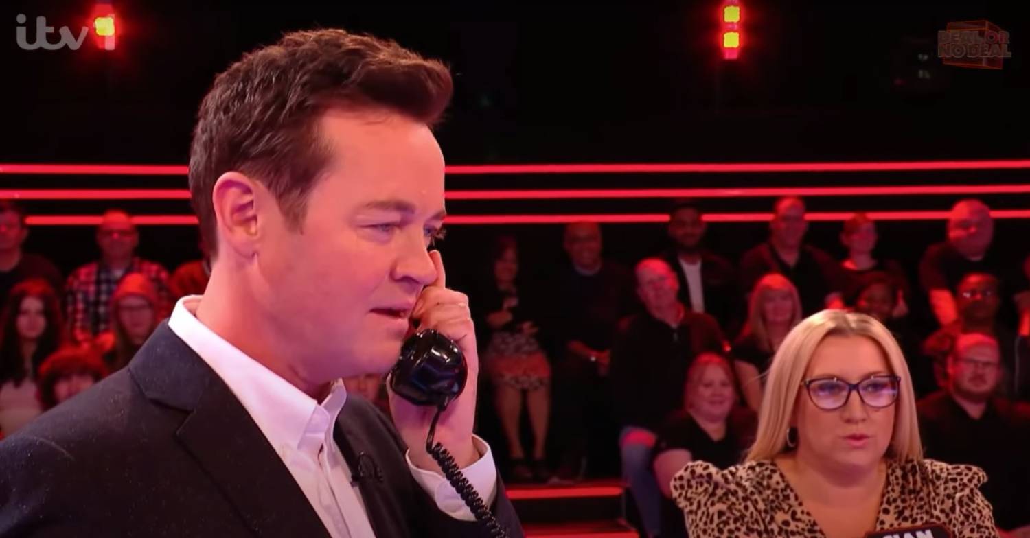Stephen Mulhern speaks into a phone