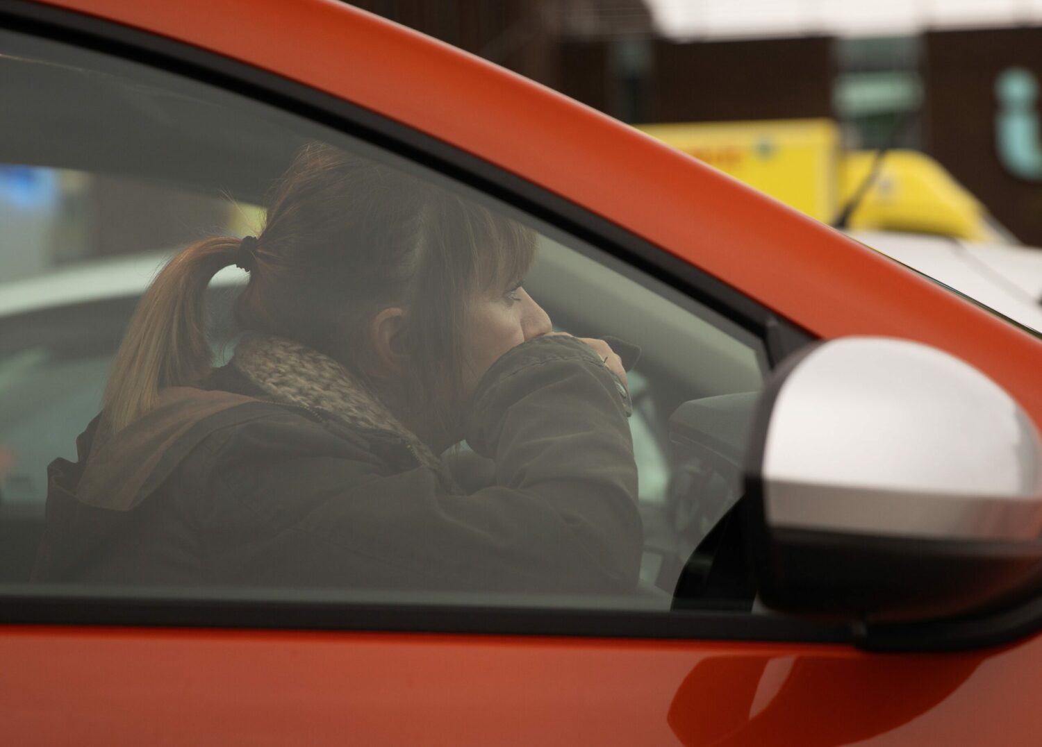 Rhona watching Gus from her car