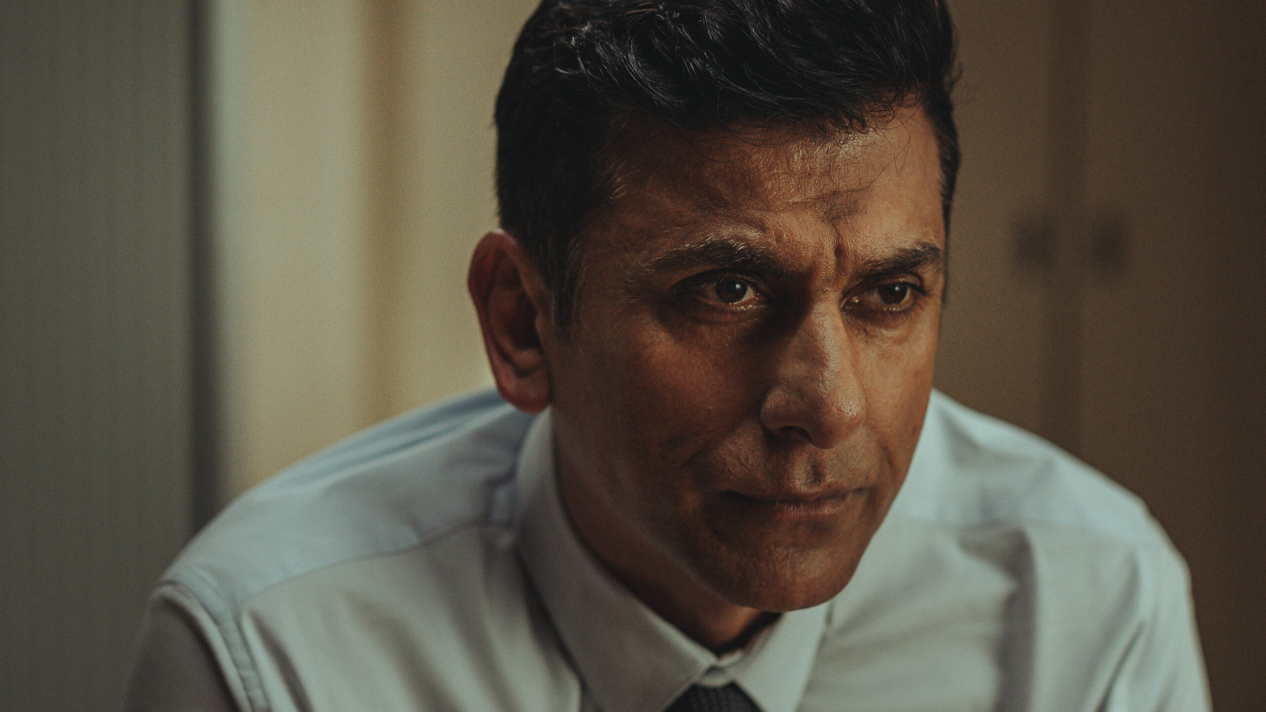 Ace Bhatti as DC Collins in The Couple Next Door