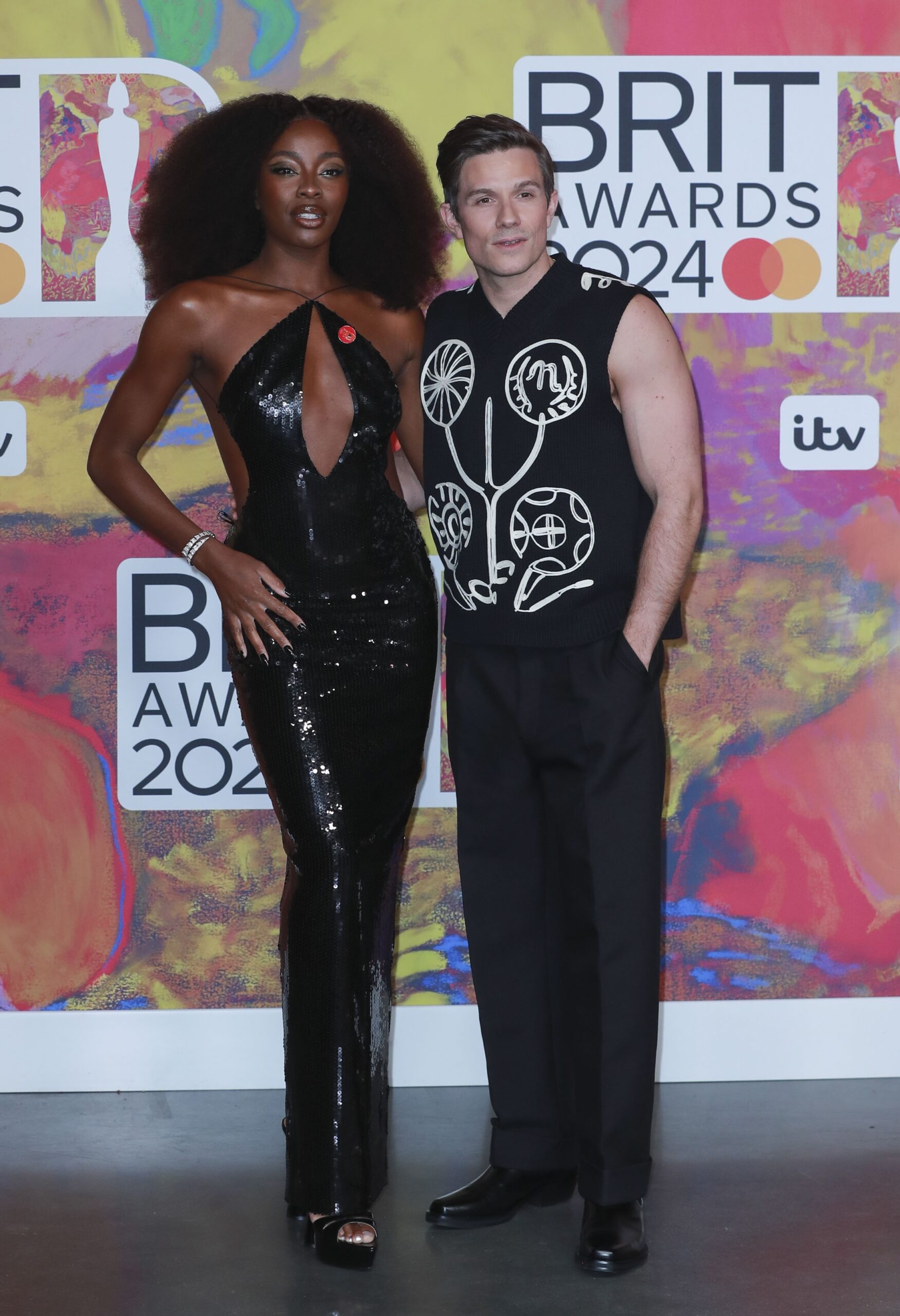 AJ Odudu and Will Best posing at the BRITs