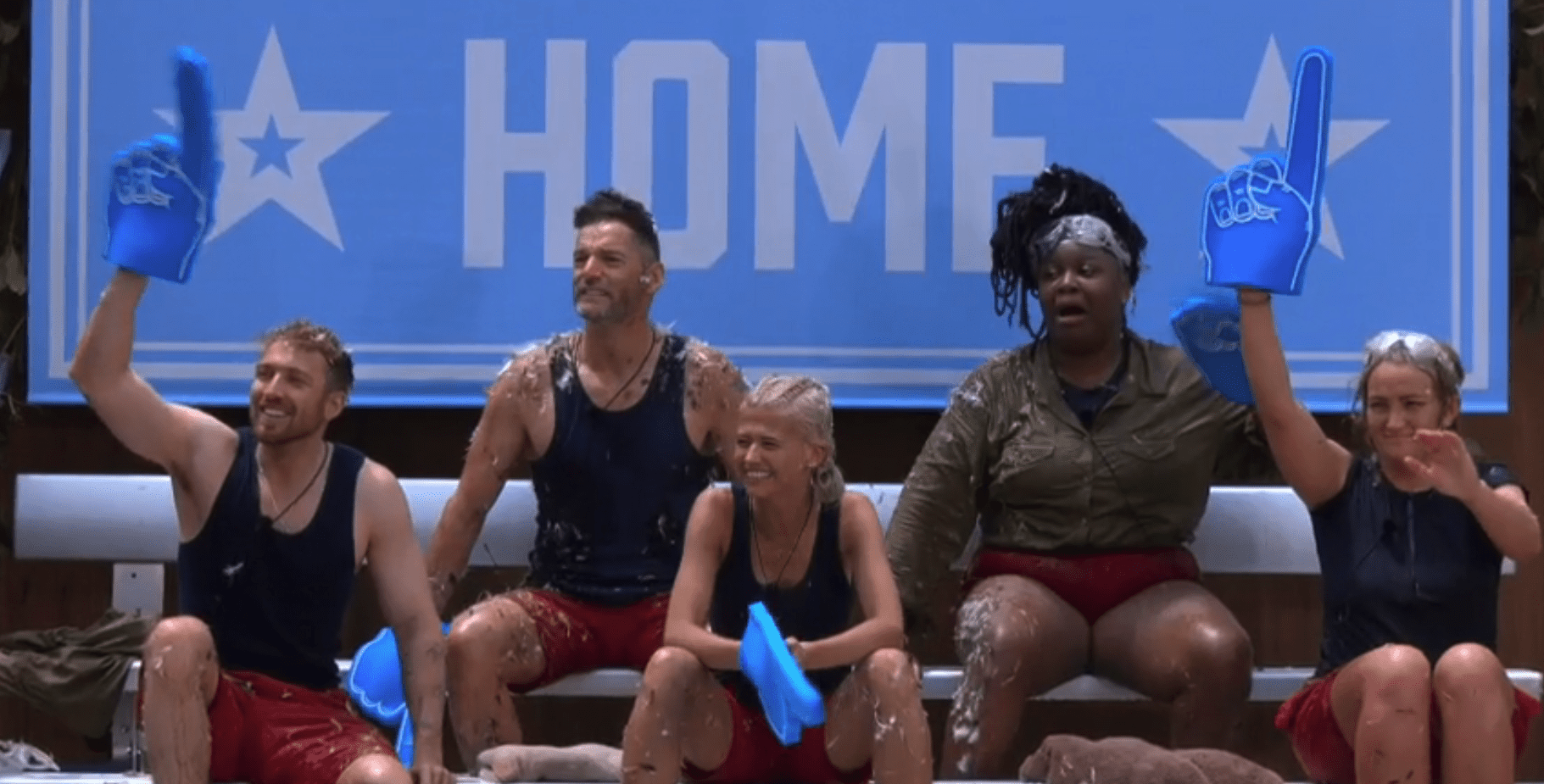 Five I'm A Celebrity campmates sitting at the trial