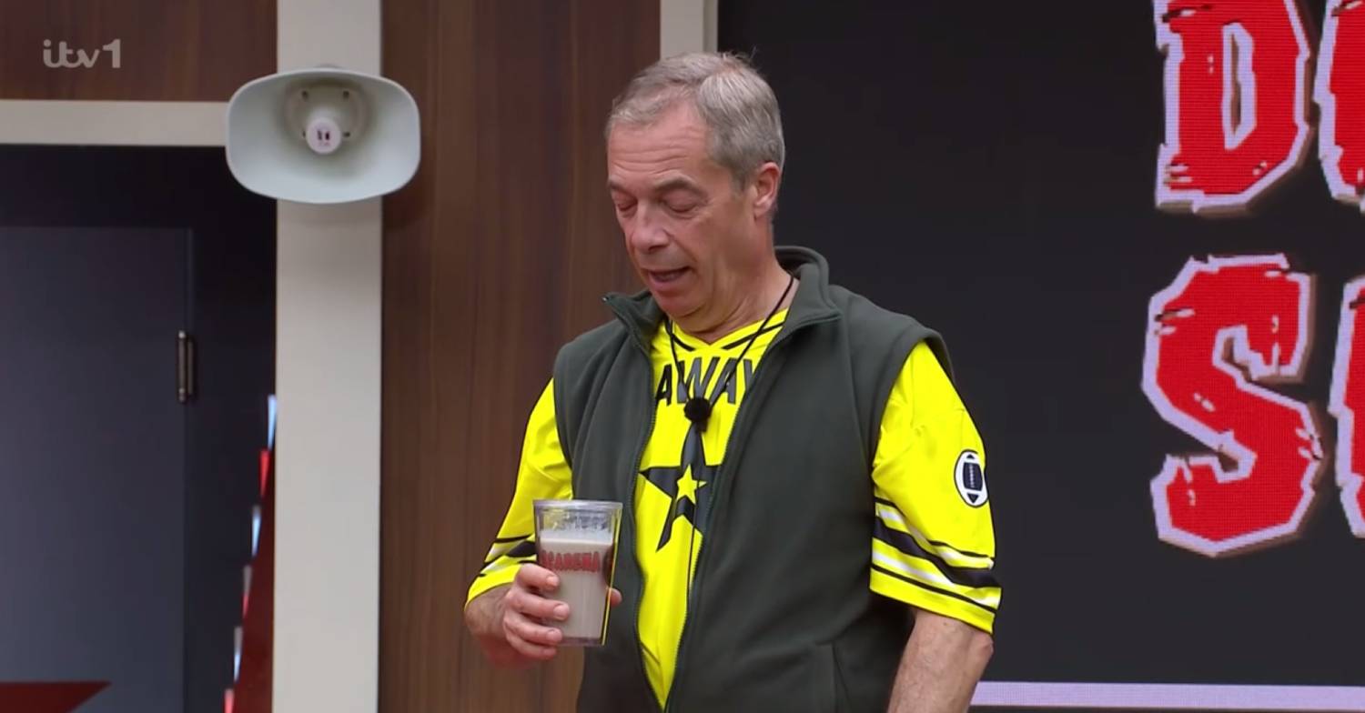Nigel Farage looks at his drink