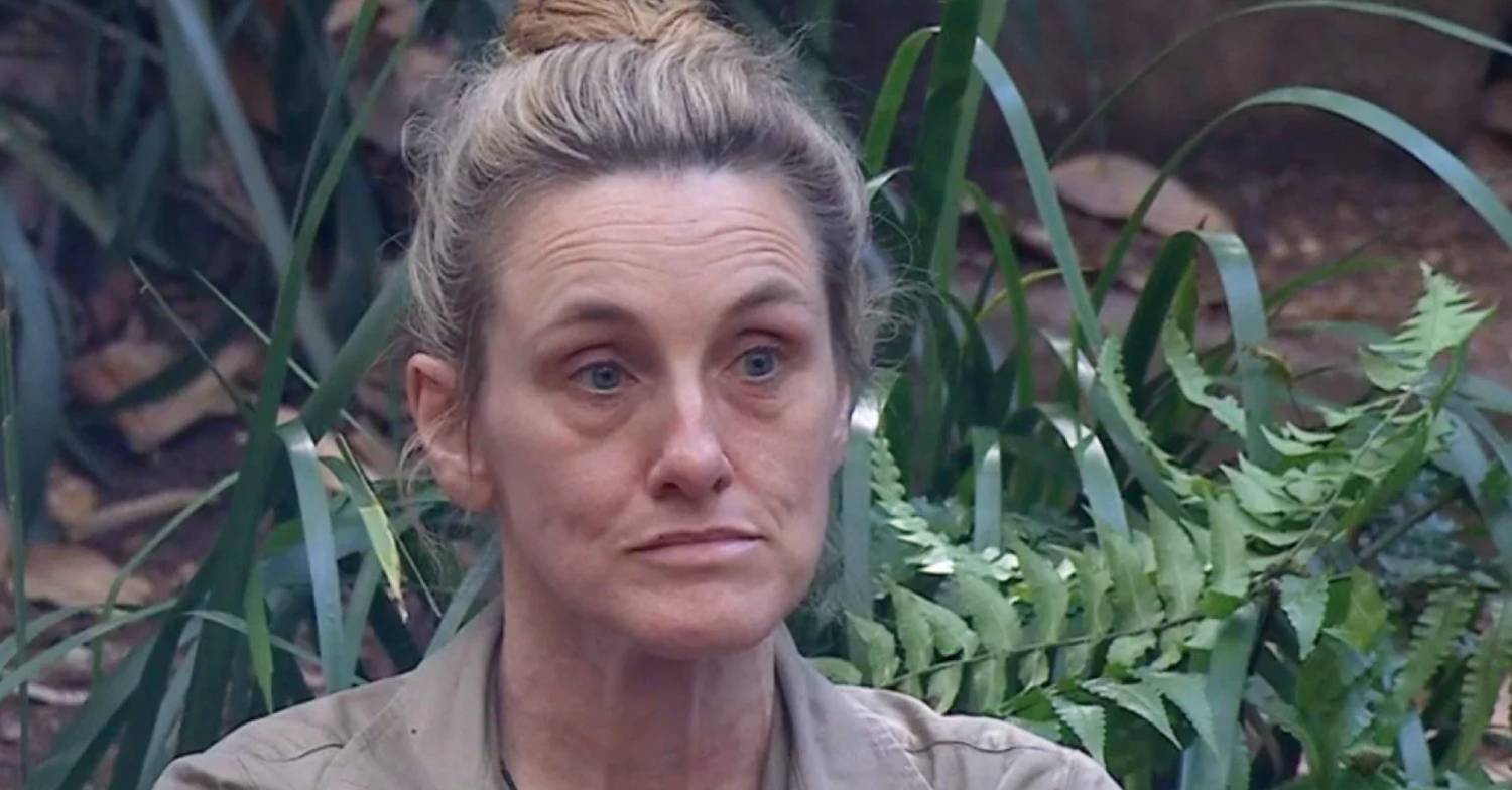 Grace Dent listens in the camp