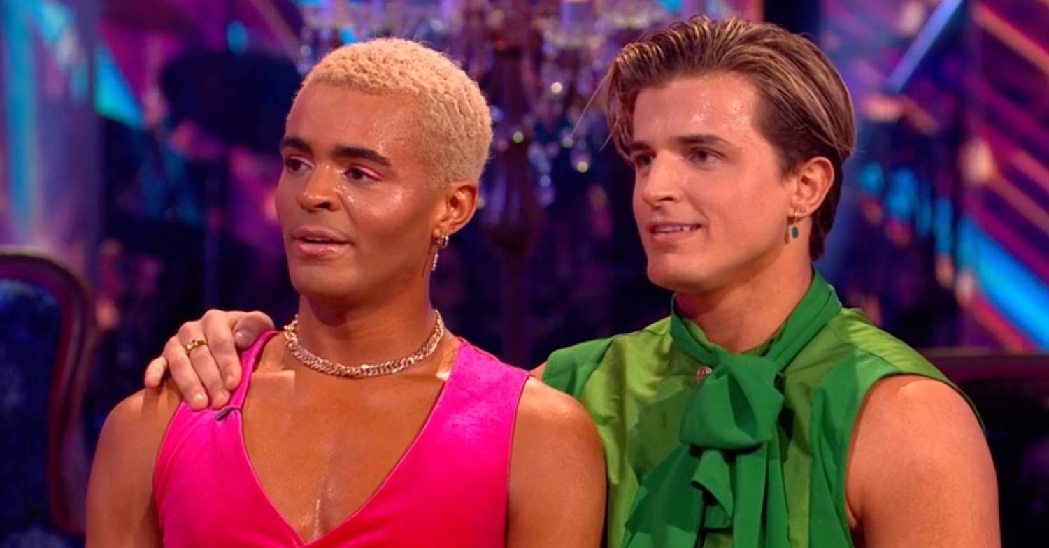 Nikita Kuzmin puts a hand on Layton Williams' shoulder