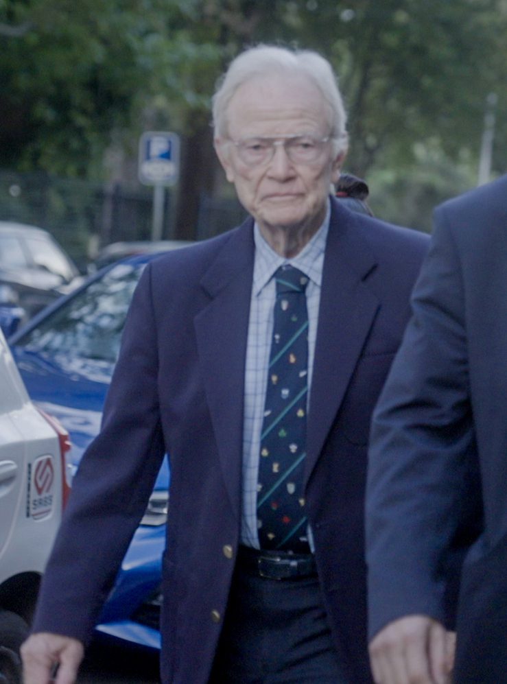 Iain Wares walking to court