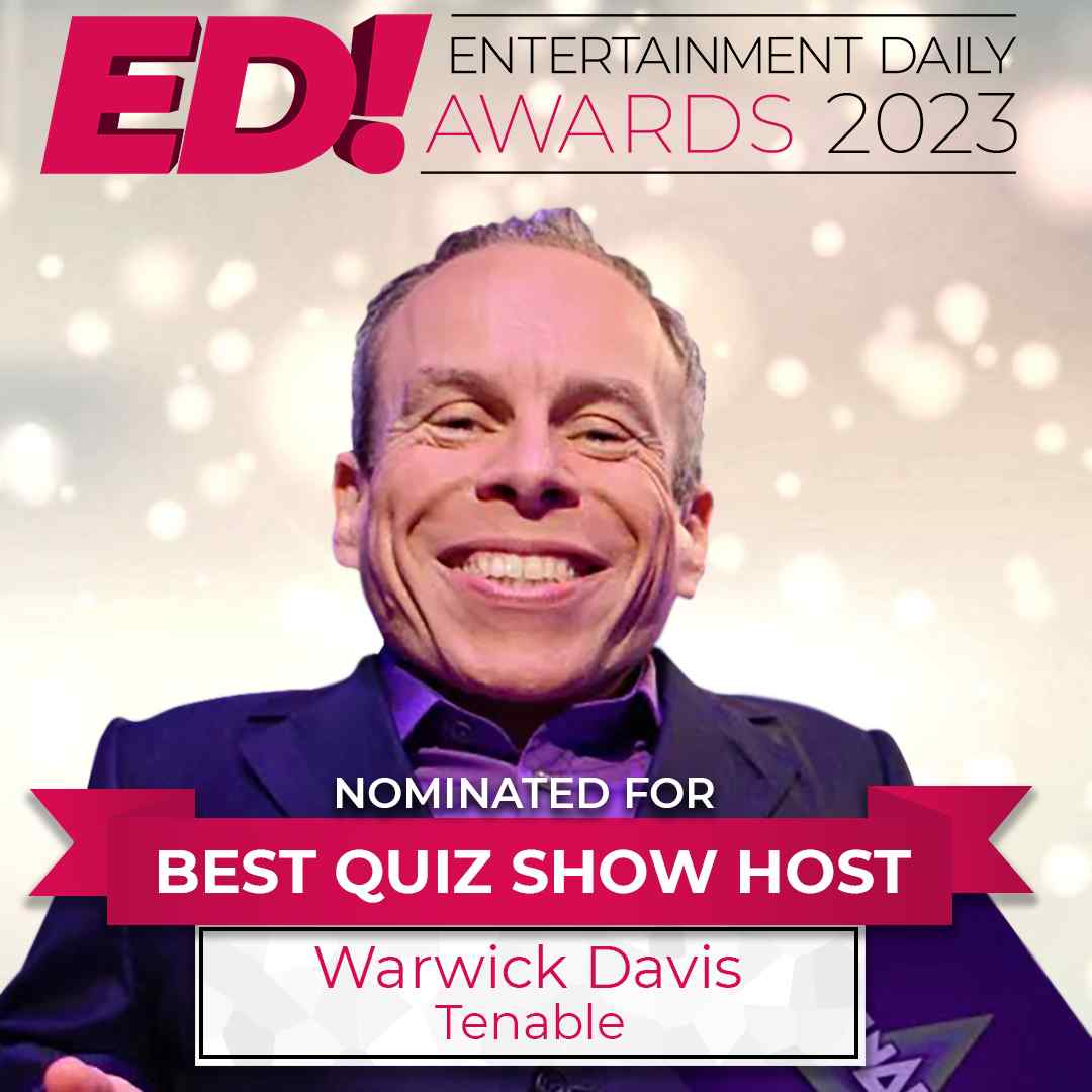 Warwick Davis smiling
