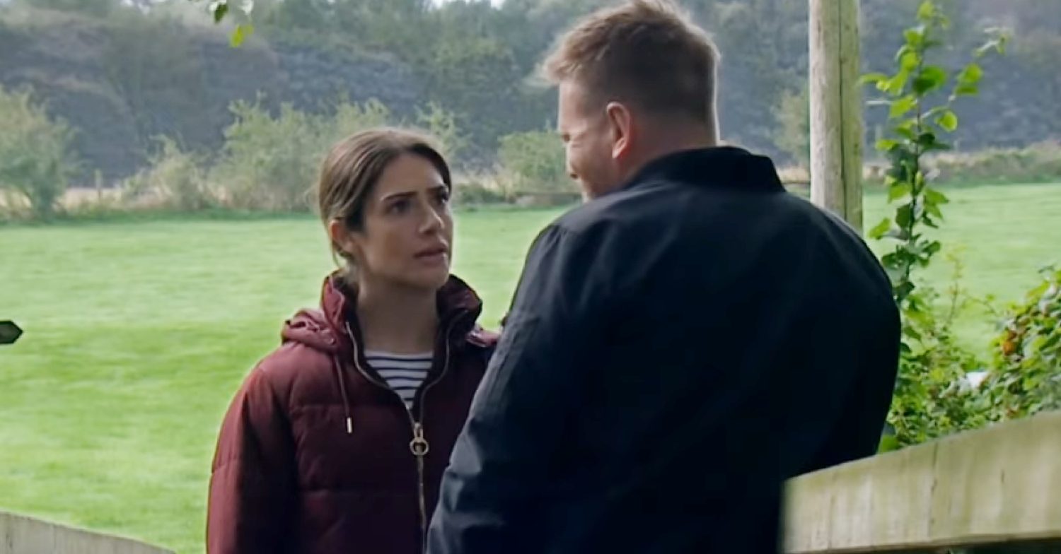 Emmerdale's Victoria and David are talking together outside