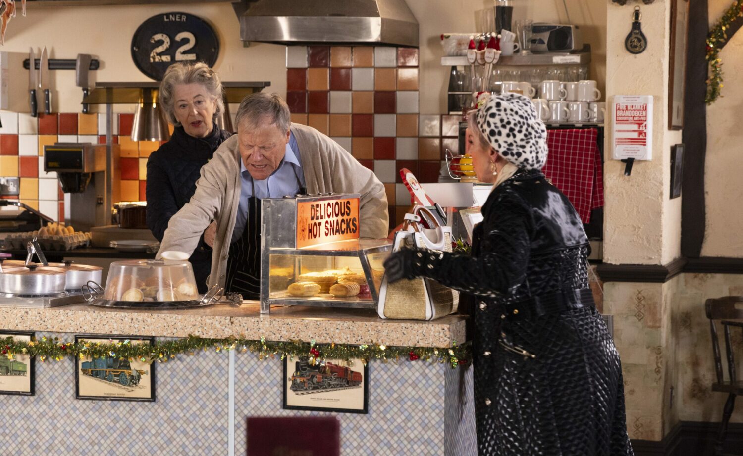 Evelyn and Debbie worry as Roy suffers a back spasm on Corrie