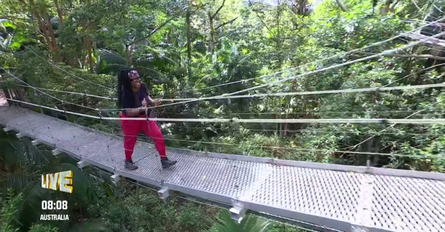 Nella Rose crosses the I'm A Celebrity jungle camp bridge
