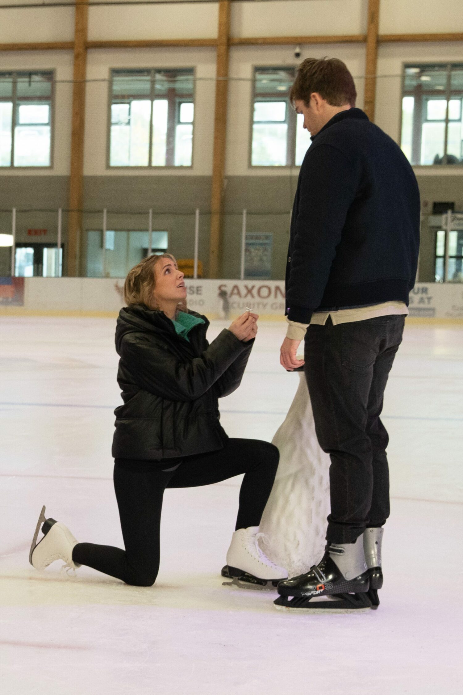 Emmerdale's Belle is down on one knee, proposing to Tom on the ice