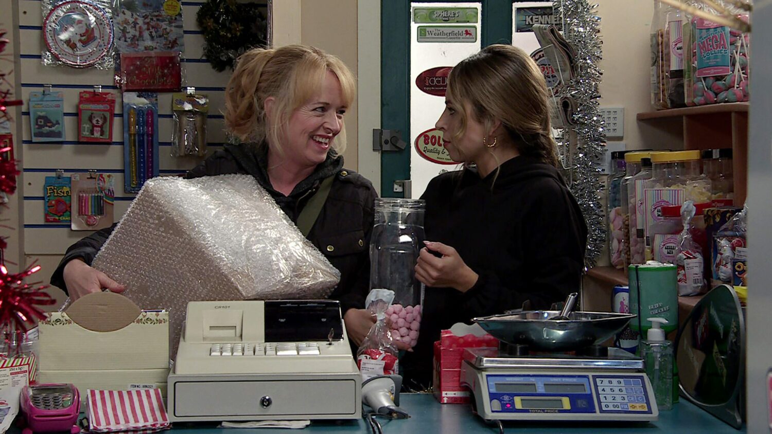 Jenny and Daisy talking excitedly on Corrie