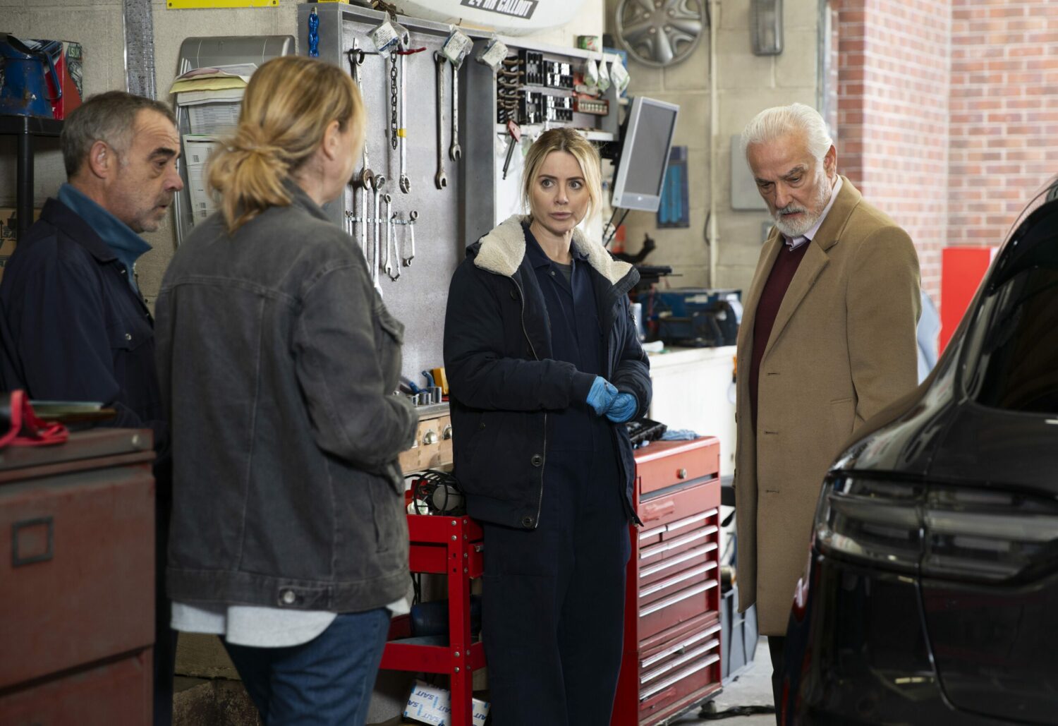 Coronation Street's Kevin, Cassie and Abi are at the garage with the car owner