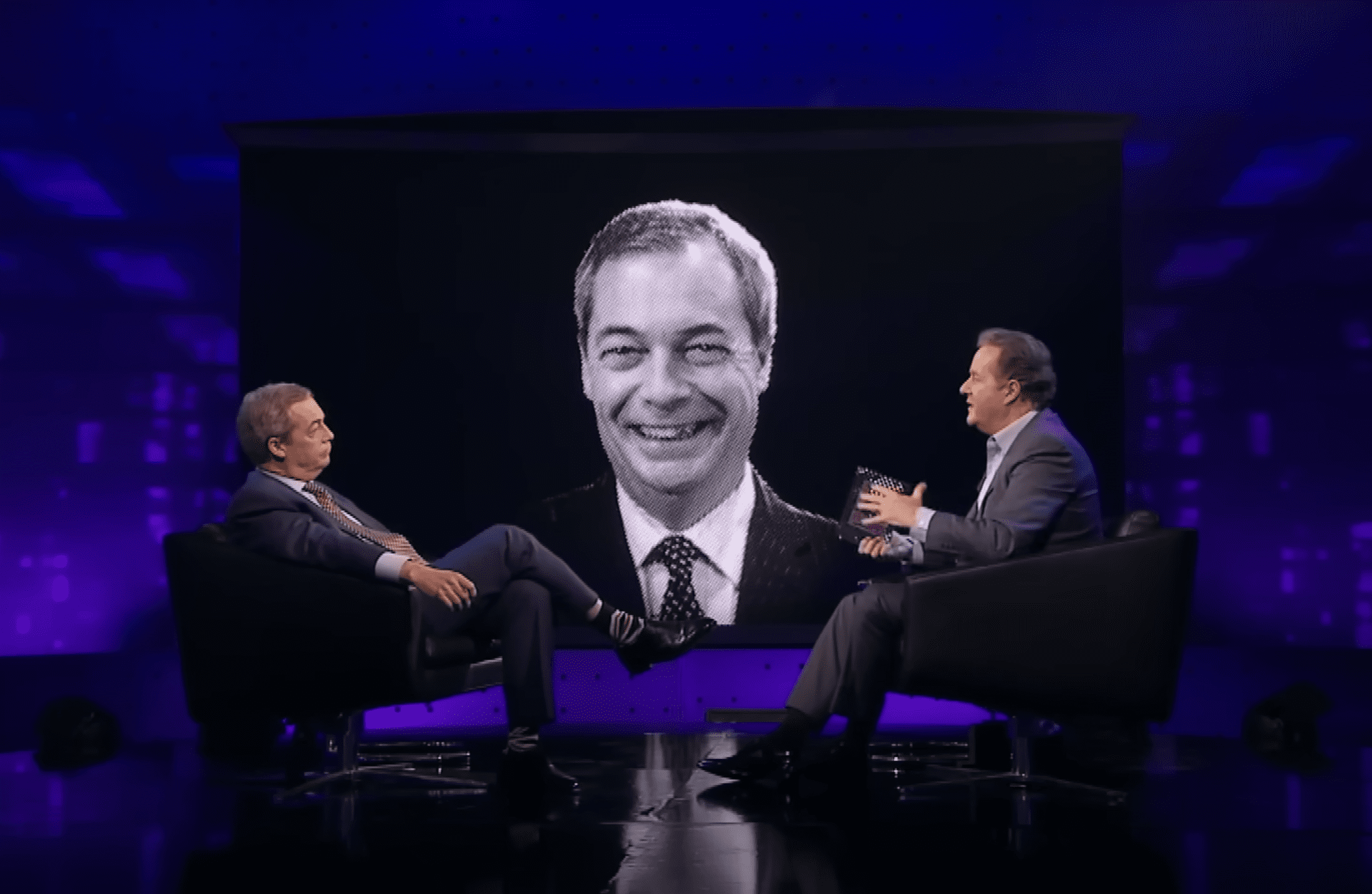 Nigel Farage and Piers Morgan sitting down either side of a large black and white image of Nigel