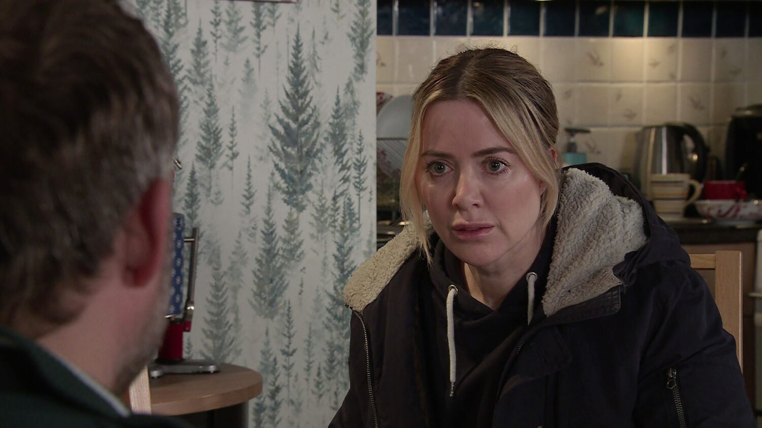 Abi looks shocked on Corrie