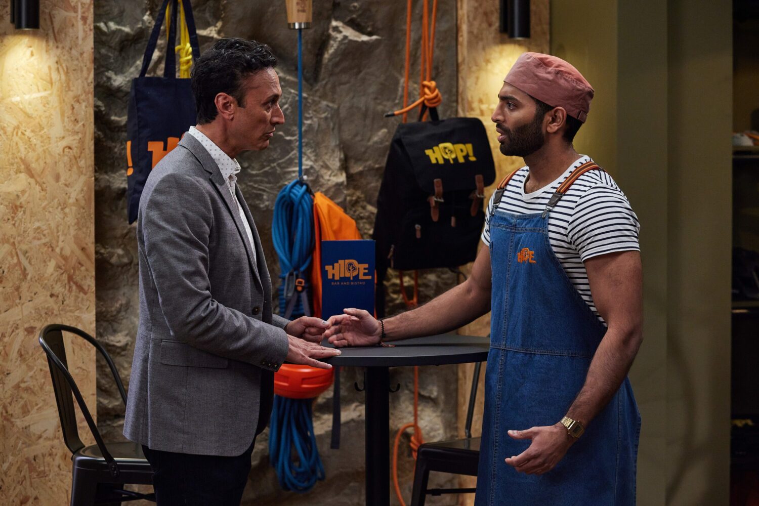 Suni looks shocked as Jai talks to him on Emmerdale