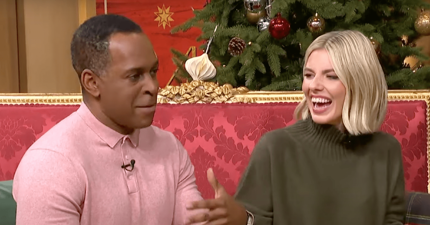 Mollie King and Andi Peters hosting This Morning while smiling