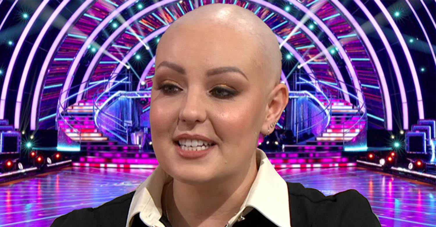 Amy Dowden smiling in front of the Strictly ballroom