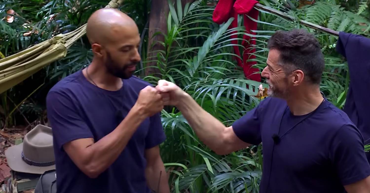 Marvin Humes bumps fists with Fred Sirieix