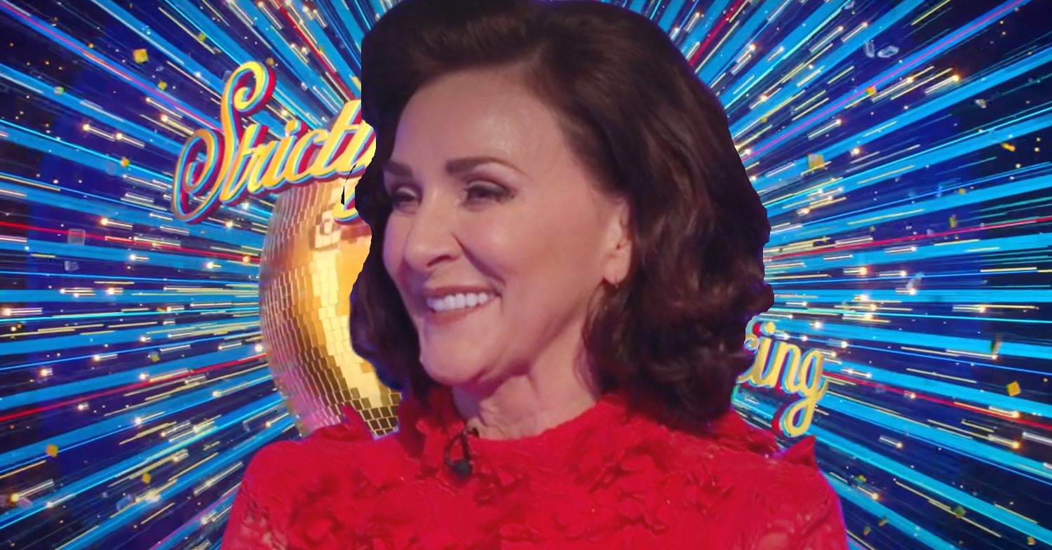 Shirley Ballas wearing a red dress smiling
