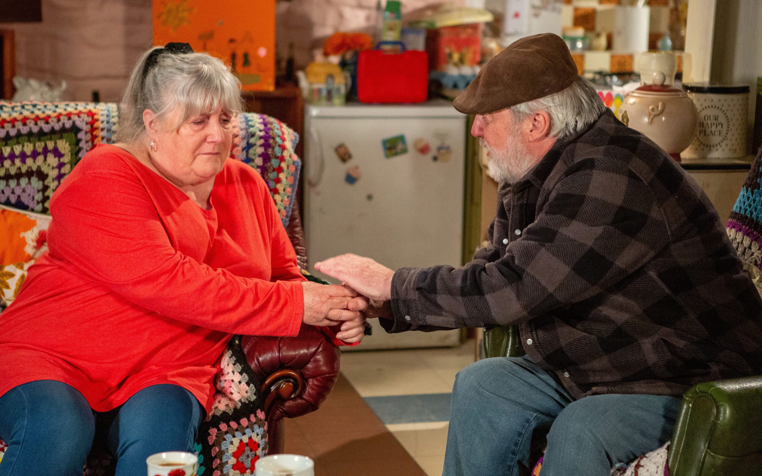 Lisa and Zak in Emmerdale hold hands and look emotional 